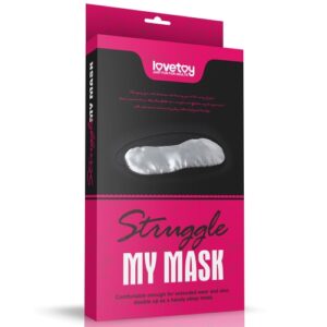 black and pink sleeping mask packaging