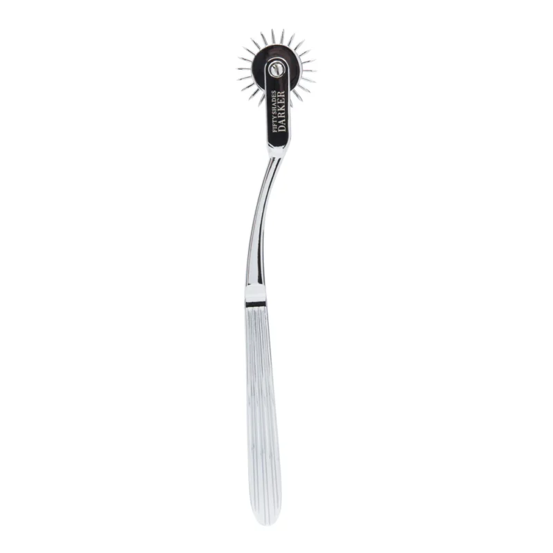 Stainless steel Wartenberg wheel used for sensory stimulation and kinky exploration.
